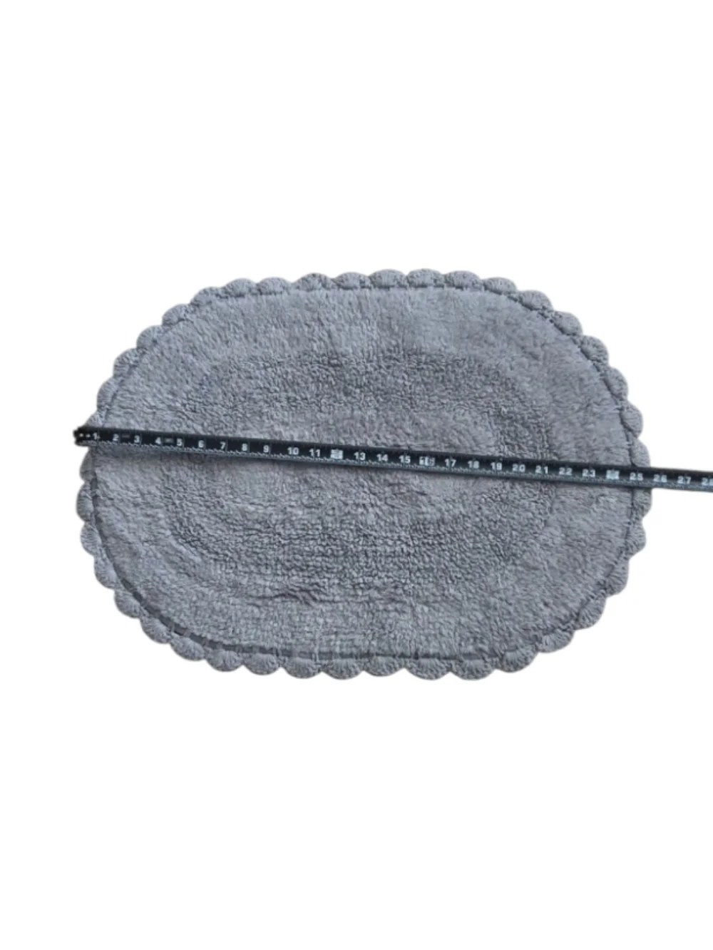 2-piece set of oval cotton bath rugs featuring a crochet border